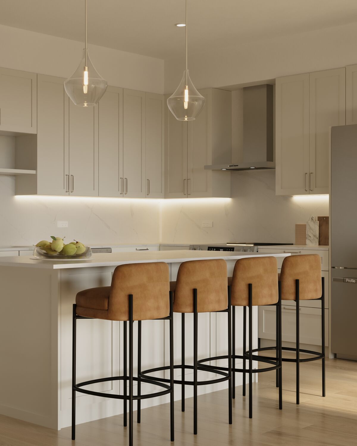 Kitchen in a Rivelle residence with Calacatta Venato quartz countertops, solid stone backsplash, and island seating. Artist's rendering.